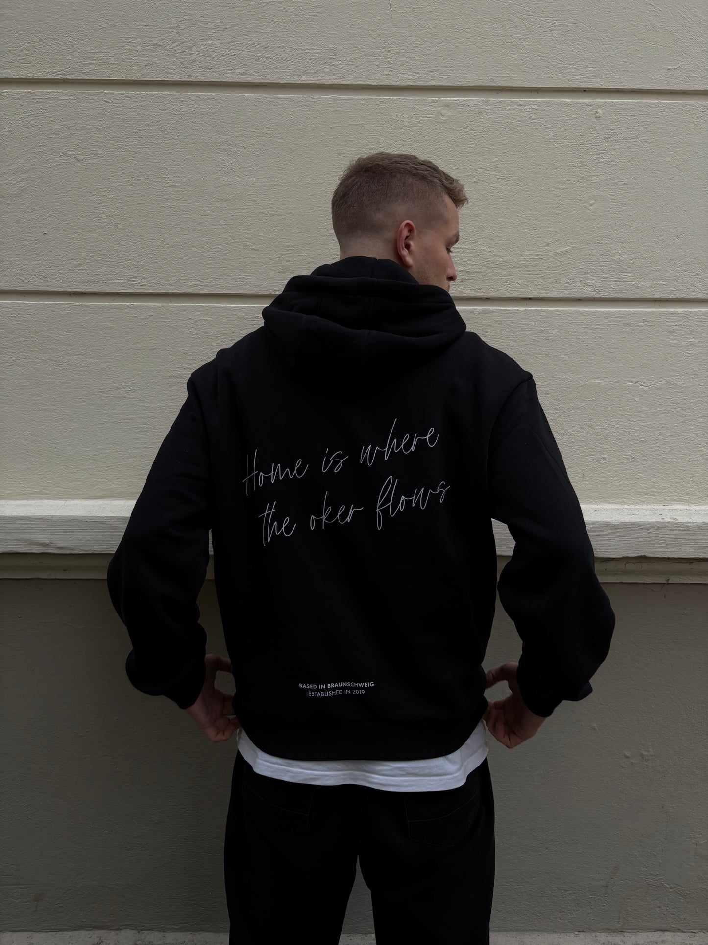 HOME IS WHERE THE OKER FLOWS HOODIE